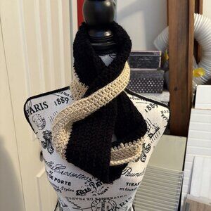 ITEM NO. 42: Black and tan neck scarf/wrap. Unisex.